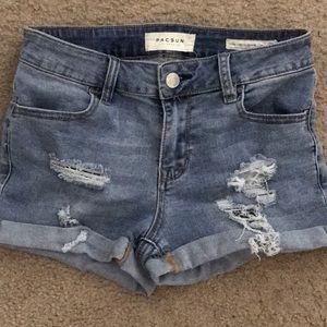 Medium wash ripped denim shorts